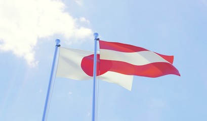 Japan and Austria, two flags waving against blue sky. 3d image