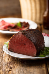 Homemade roast beef served on a white plate