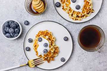 Fresh homemade waffles with blueberries for breakfast