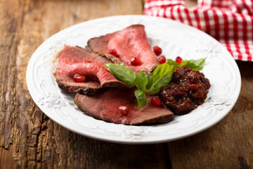 Roast beef with pomegranate sauce