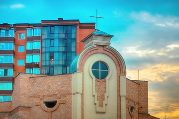 Church in summer at blue cloudy sky