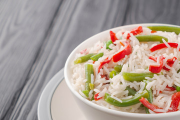 Fresh rice with sweet peppers and green beans. Top view.