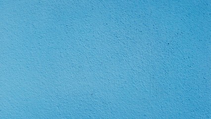 Abstract backgroundlight blue of rough cement.