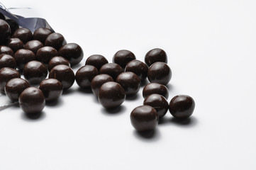 Tasty chocolate balls isolated on a white background