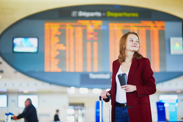 Young woman in international airport