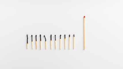 Red paper plane leading another ones, leadership concept