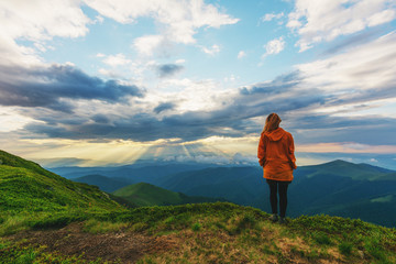 A wonderful summer vacation with fantastic landscapes in the Ukrainian Carpathians on the Borzhava ridge, with a dramatic storm and a traveling girl.