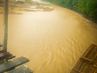 Bamboo Raft on The Yellow Stream where The Water Flows