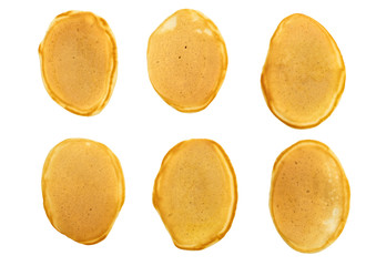 Six different pancakes isolated on white. Top view.