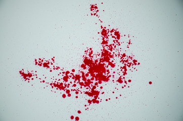 Red drops on white background