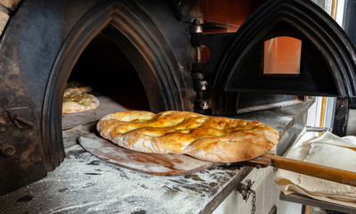 Schiacciata is a kind of bread made in Tuscany, Italy.