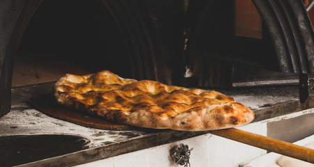 Schiacciata is a kind of bread made in Tuscany, Italy.