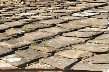 Old stone slabs on a roof closeup in Bulgaria