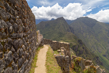 Fototapeta na wymiar panoramic view Machu Picchu, Peru - Ruins of Inca Empire city and Huaynapicchu Mountain, Sacred Valley