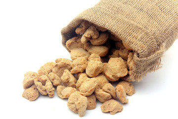 Soy meat in chunks on white background. Raw soybeans chunks