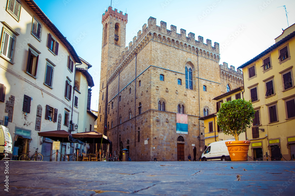 Wall mural panoramic view of famous palazzo vecchio, old houses and cobbled streets in florence, tuscany, italy