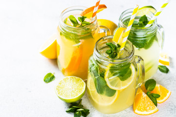 Lemonade, mojito and orange lemonade on white.