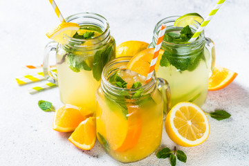Lemonade, mojito and orange lemonade on white.