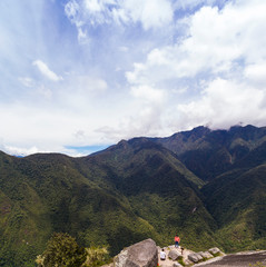 Fototapeta premium panoramic view Machu Picchu, Peru - Ruins of Inca Empire city and Huaynapicchu Mountain, Sacred Valley