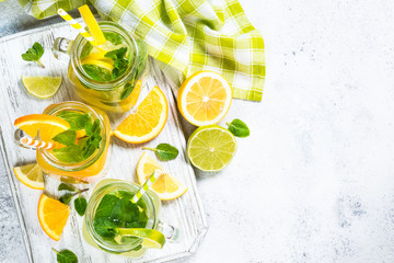 Lemonade, mojito and orange lemonade on white.