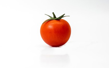 Tomato cherry isolated on white background.Side view.