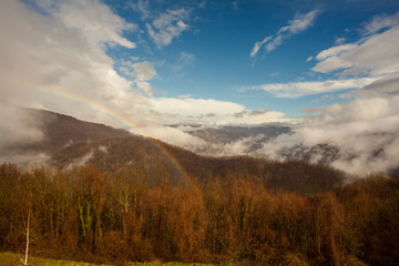 Fototapeta na wymiar Rainbow on the Slovenian mountains