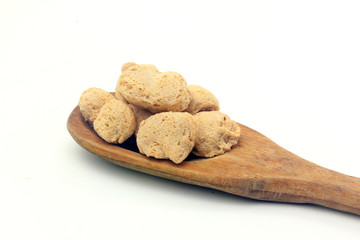 Soy meat in chunks on white background. Raw soybeans chunks