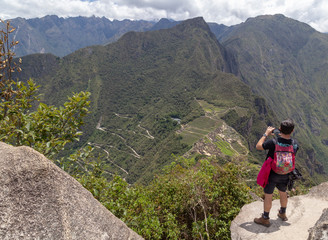 Machu Picchu- December 20, 2018,tourist on top of the mountain, Huayna Picchu, Machu Picchu, Peru