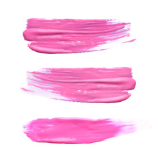 Set with abstract brushstrokes of pink paint on white background, top view