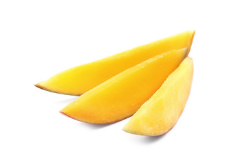 Slices of delicious ripe mango on white background