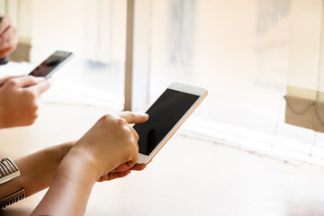 The hipster girl using mouile phone,touching on screen ,hipster hands texting mobile phone,
