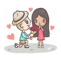 Cute couple moment a guy is down on his knee and giving a girl red rose bouauet