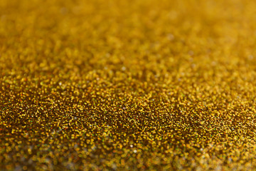 Closeup view of sparkling golden glitter background