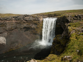 A beautiful waterfall close to Skógafoss. Iceland, perfect destination for hikers. The Legendary Laugavegur Trek.