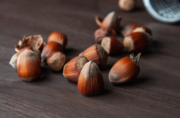 hazelnuts on wooden background
