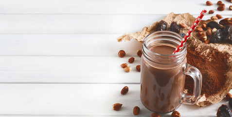 Natural detox chocolate smoothie ingredients on white background
