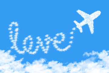 Airplane shape clouds love route. Romantic travel concept