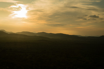 Naklejka na ściany i meble sunrise over the hills of sigiriya in Sri Lanka