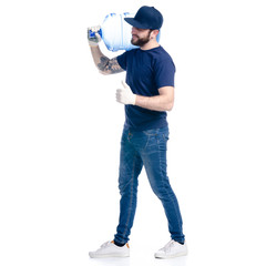 Water delivery man in blue t-shirt and cap go goes on white background isolation