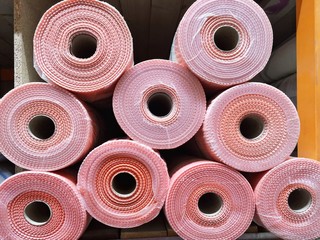 Rolled protection fiberglass building material. Roll of protection barrier fiber for building. 