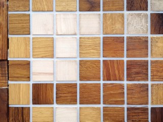 Pattern abstract wooden background with colorful wood squares and selective focus 