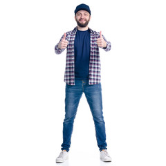 Fototapeta premium Man in jeans, shirt and cap standing smiling super good on white background isolation