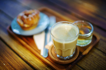 coffee and sweet bakery breakfast with morning lighting