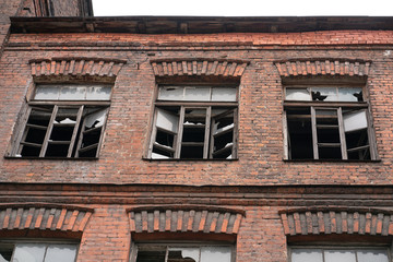 old abandoned town, brick buildings with broken Windows
