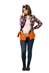 A full-length shot of a Young worker woman having doubts over isolated white background