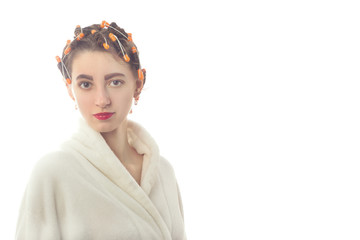 woman with hair curlers