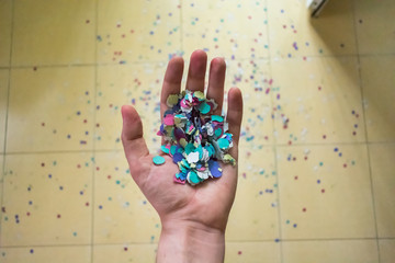 Confetti on yellow background