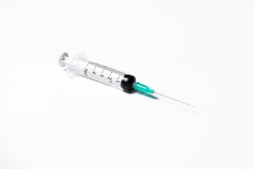 Empty medical syringe closeup isolated on white background