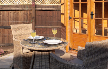 Fototapeta na wymiar Table set for outdoor dining in sunshine