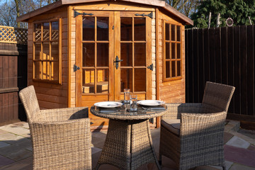 Table set for outdoor dining in sunshine